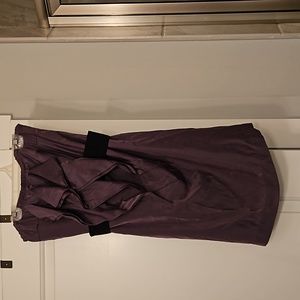 Purple strapless dress.